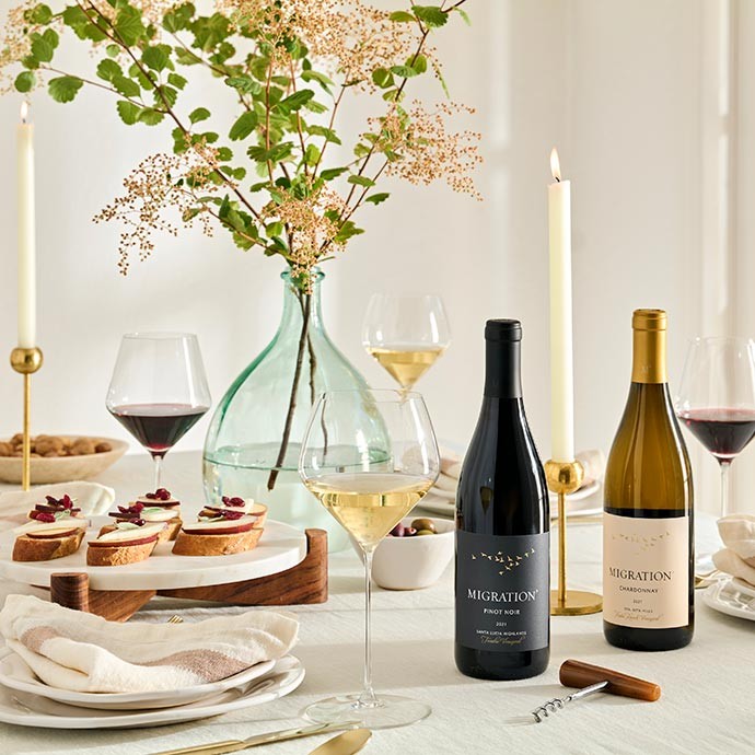 Two Migration wines on a table